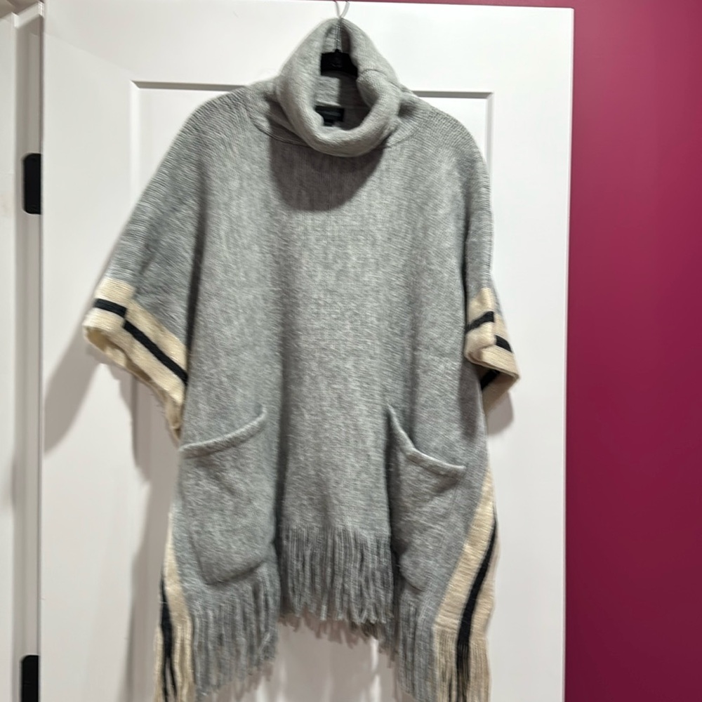Steve Madden Poncho with shimmer and fringe. OSFM